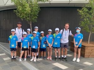 Junior tennis students play at the Aus Open