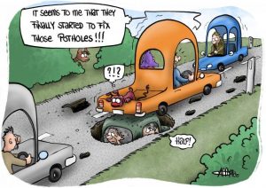 CARTOON: Pothole road race