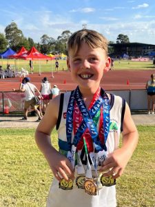 Little Athletes draped in State Championship bling