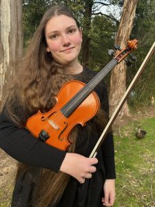 Young Yarra Junction violinist taking her place among the best in orchestra